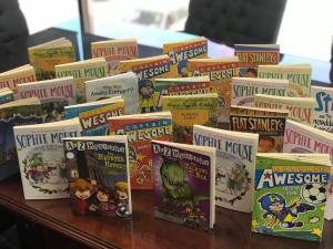 Noyes Family Foundation donated 40 books to a local school.